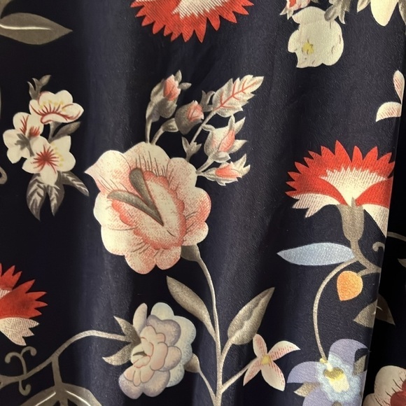 One❤️Clothing navy blue floral long sleeved romper. Size XS. Open V in the back. - Picture 7 of 14